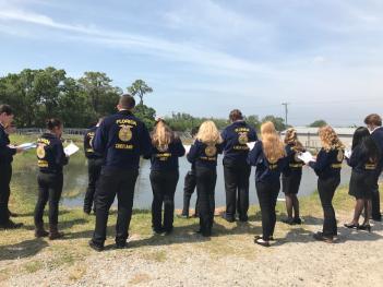 FFA students at pond for CDE