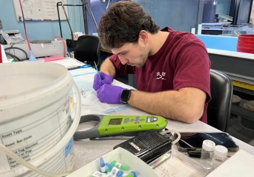 Charles Heyder working at lab bench