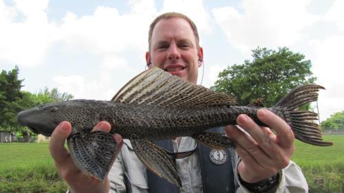 Jeff Hill with a plecostomus